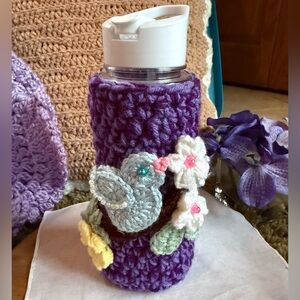 Purple Crochet Water Bottle Cozy with Bird and Flower Design